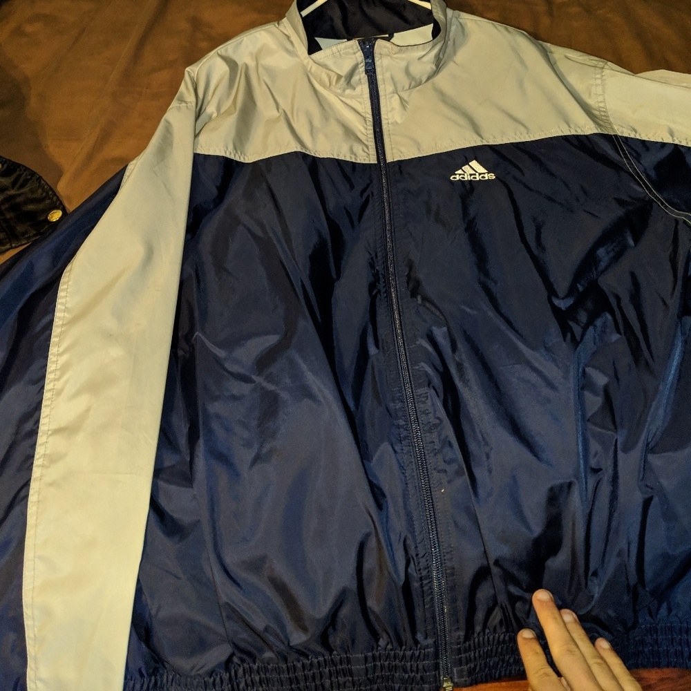 Blue and silver adidas wind breaker